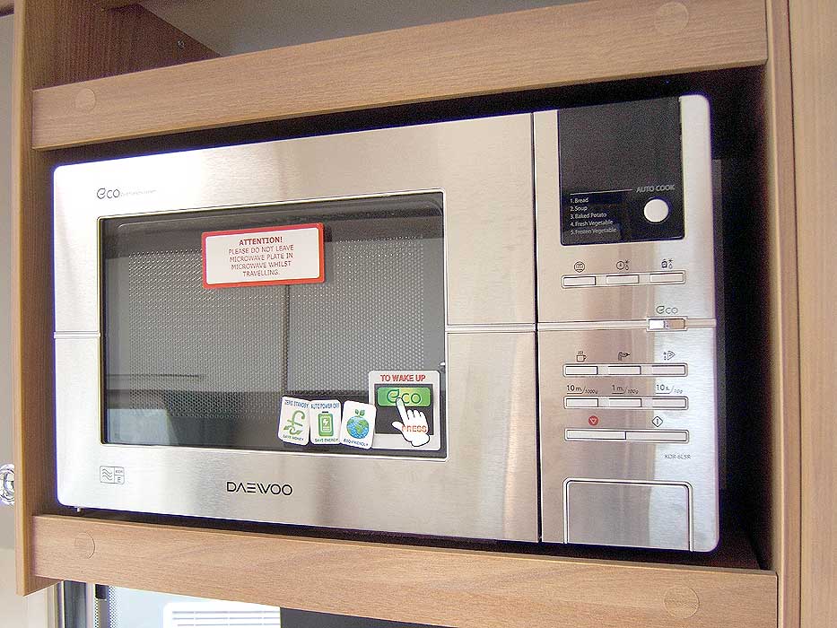 The Daewoo microwave provides additional cooking options.